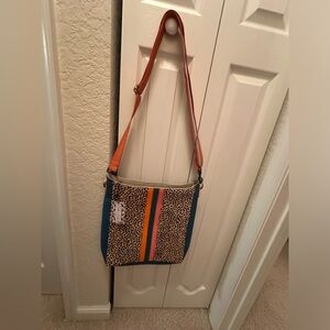 Colorful orange, pink and turquoise animal print large crossbody or shoulder bag